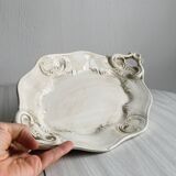 Tray, old dish with handles and relief patterns.