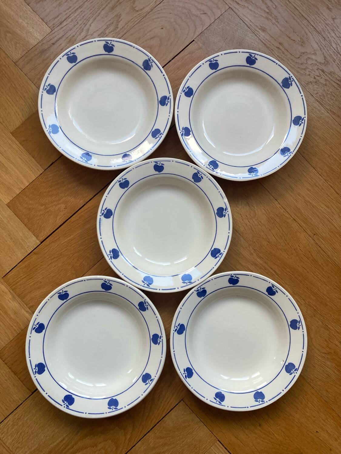 Deep plates with blue apple pattern