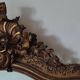 Antique Louis Philippe mirror with a pediment.