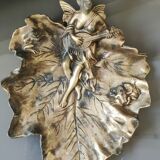 Art Nouveau pocket emptier/Woman with mandolin on vine leaves in spelter