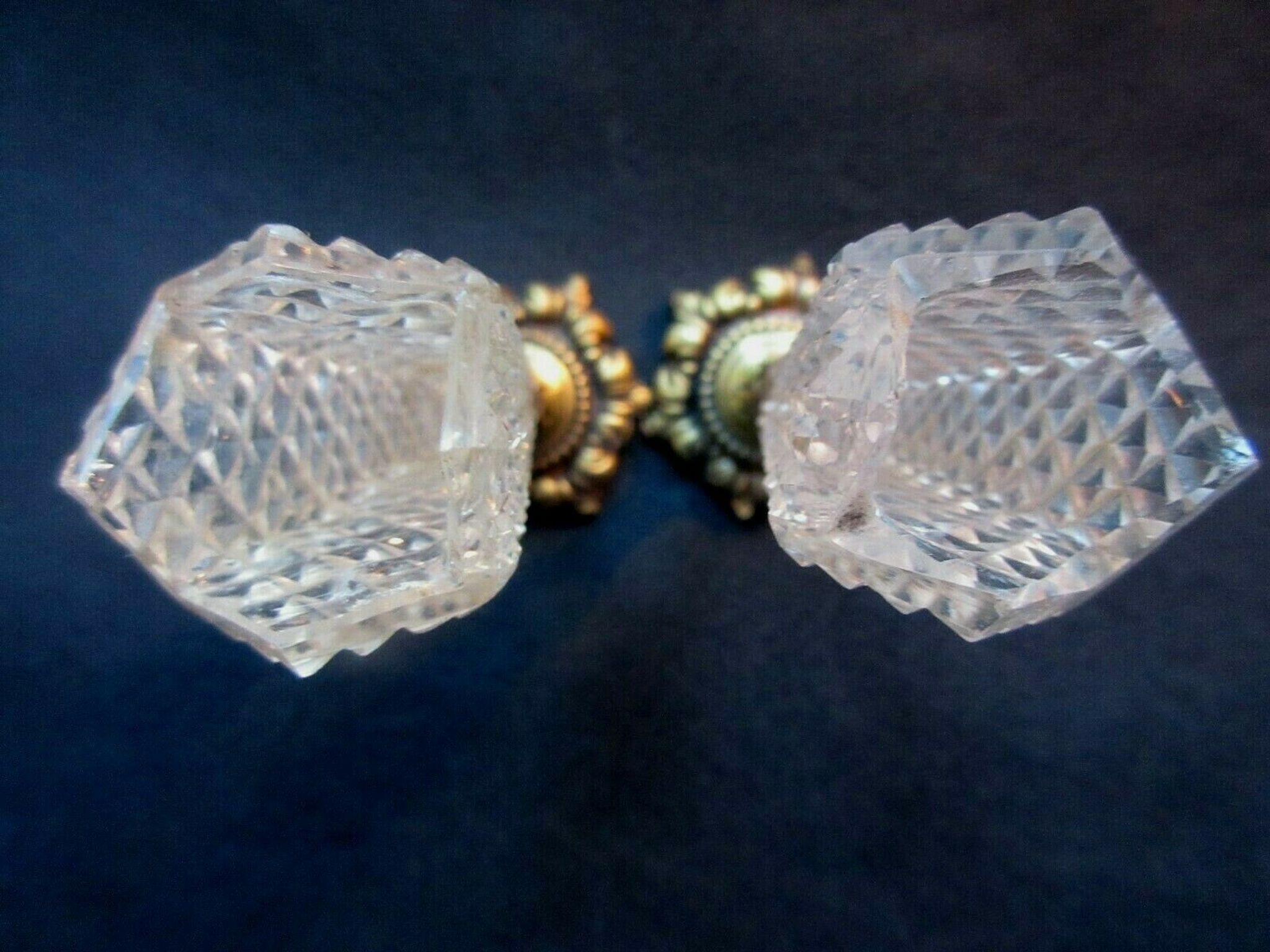 Duo of crystal vases Baccarat Le Creusot, carnation holder, bronze foot