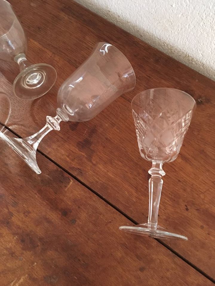Four mismatched stemware