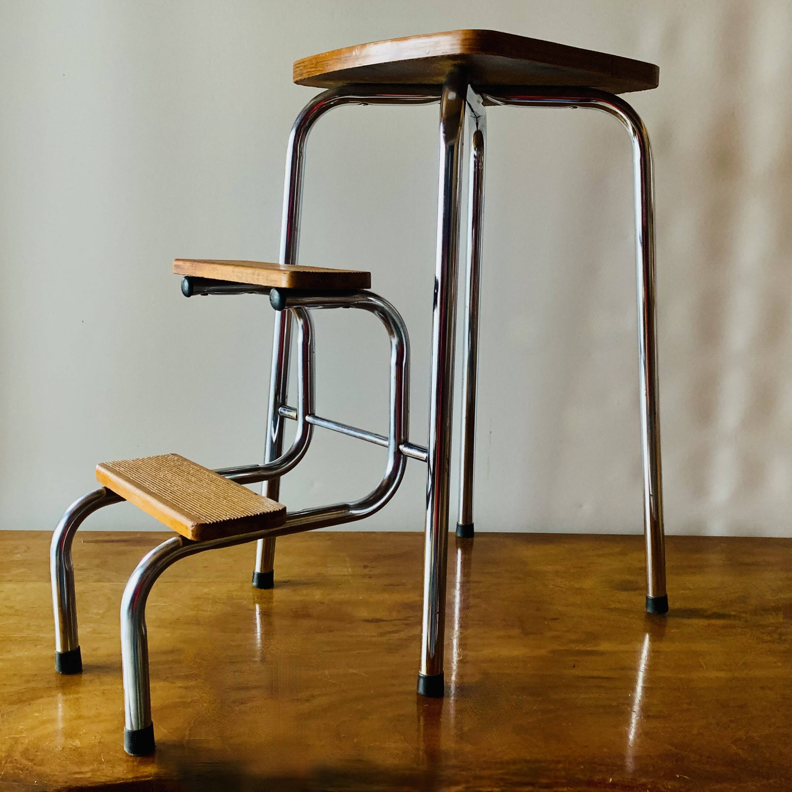 Vintage step stool in brown formica and chrome steel