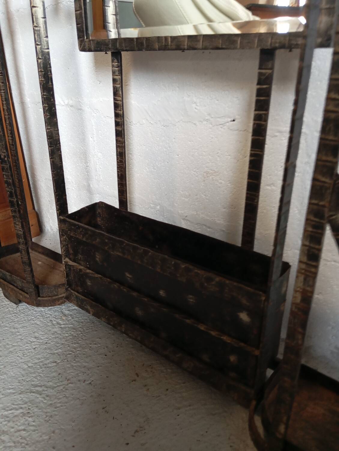 Exceptional and imposing hall wardrobe in hammered wrought iron.