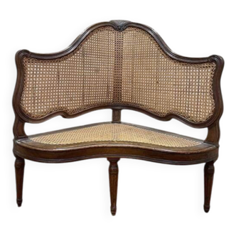 Banquette en encoignure époque Louis XVI en cannage