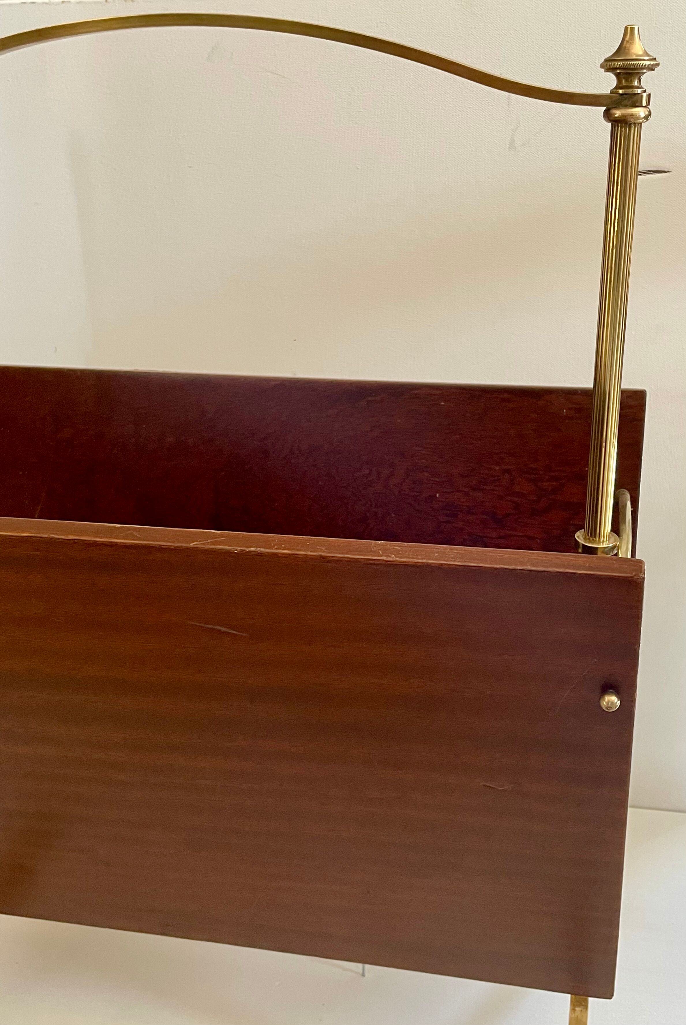 Magazine racks with claw feet by Maison Jansen