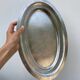 Oval stainless steel dish, signed Rémi Letang