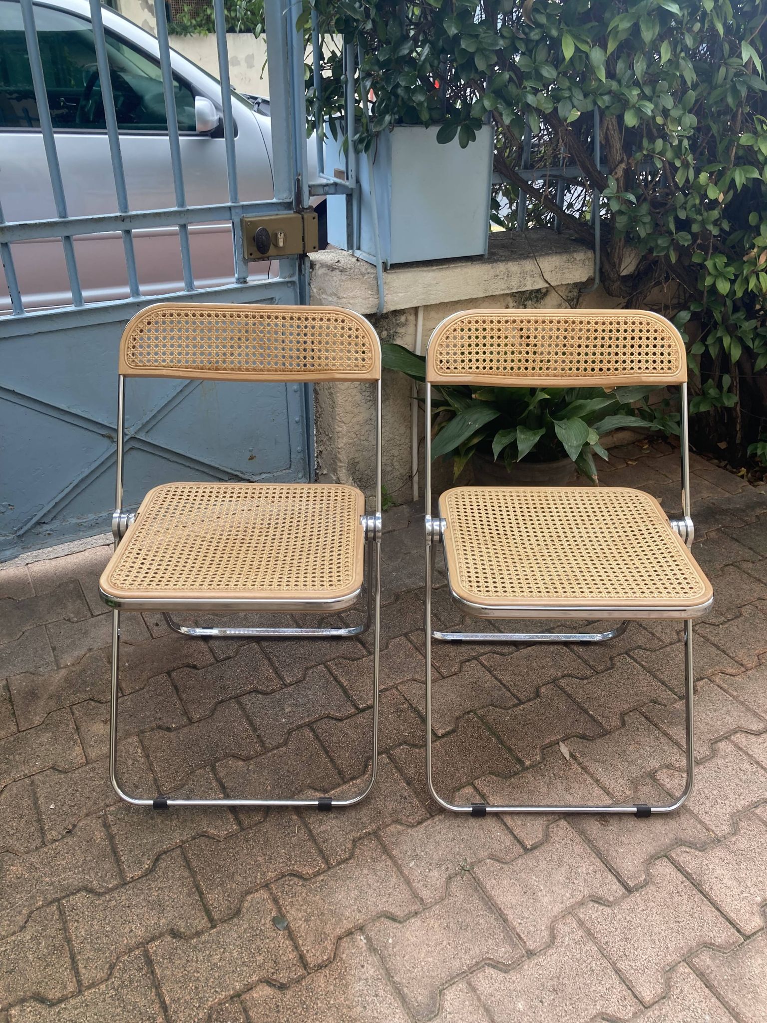 Plia chairs by Castelli in wood and cane.