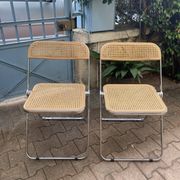 Plia chairs by Castelli in wood and cane.