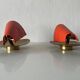Pair of orange plexiglass and curved brass wall lights, 1950s, Germany