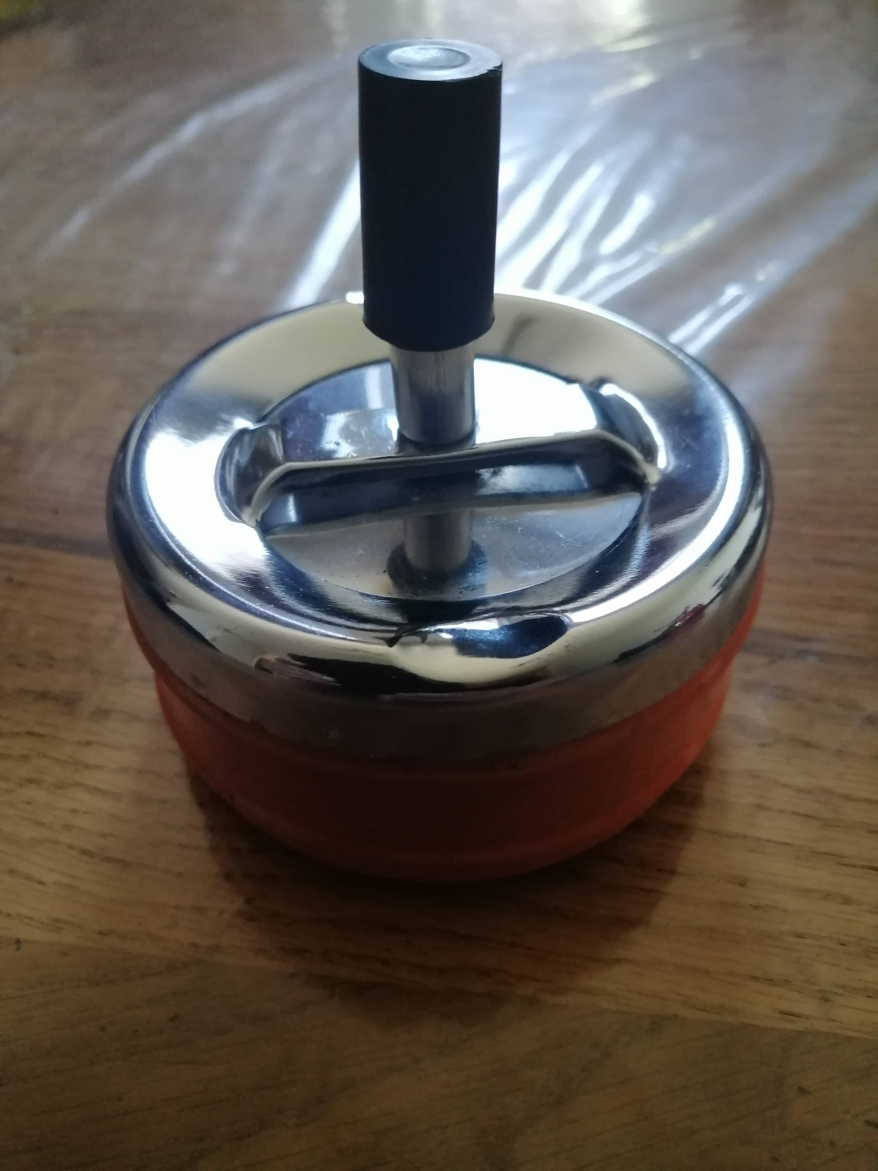 Vintage orange rotating ashtray