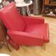 Fauteuil en skai rouge et pieds compas vers 1950