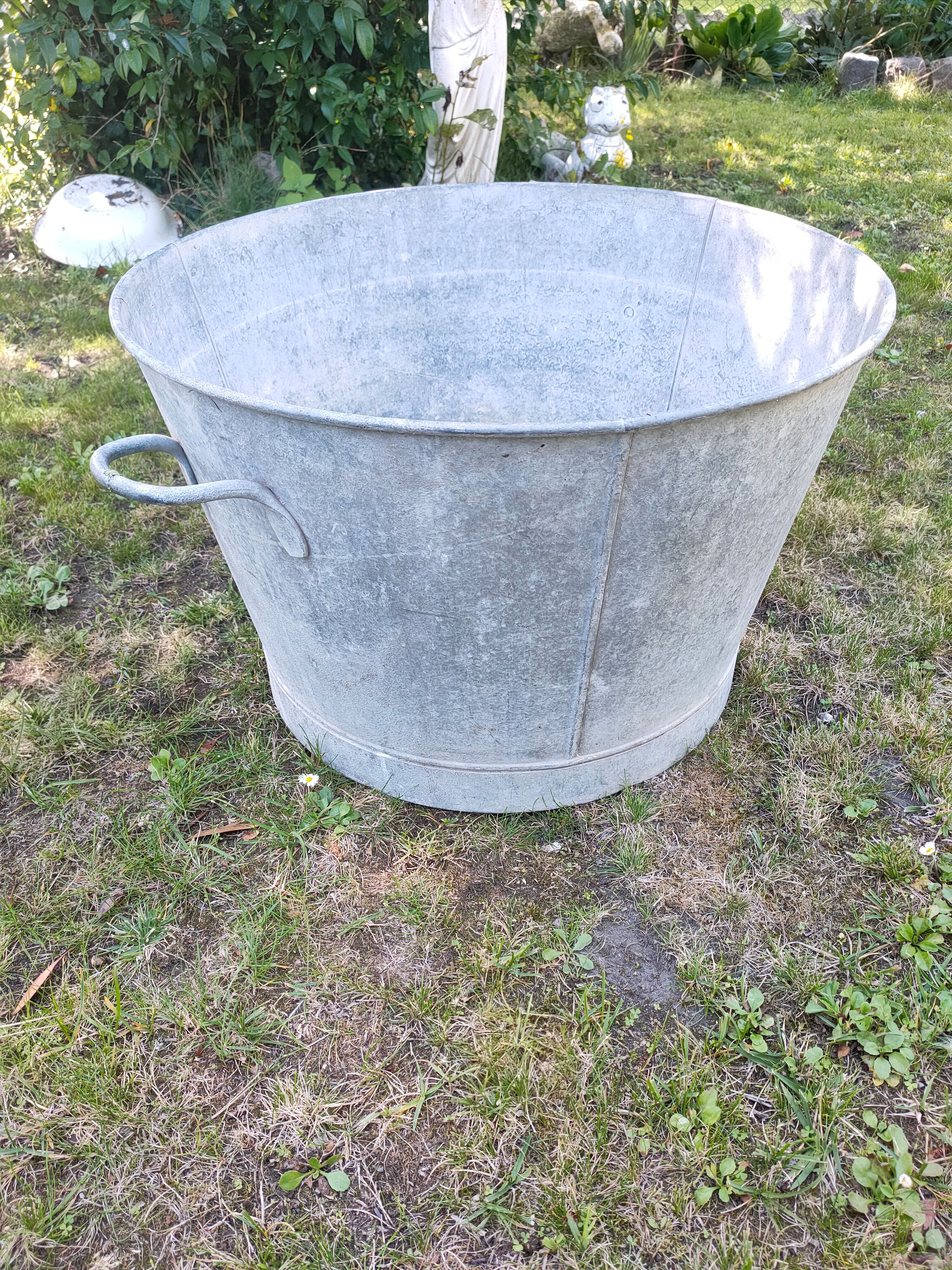 Old round zinc basin