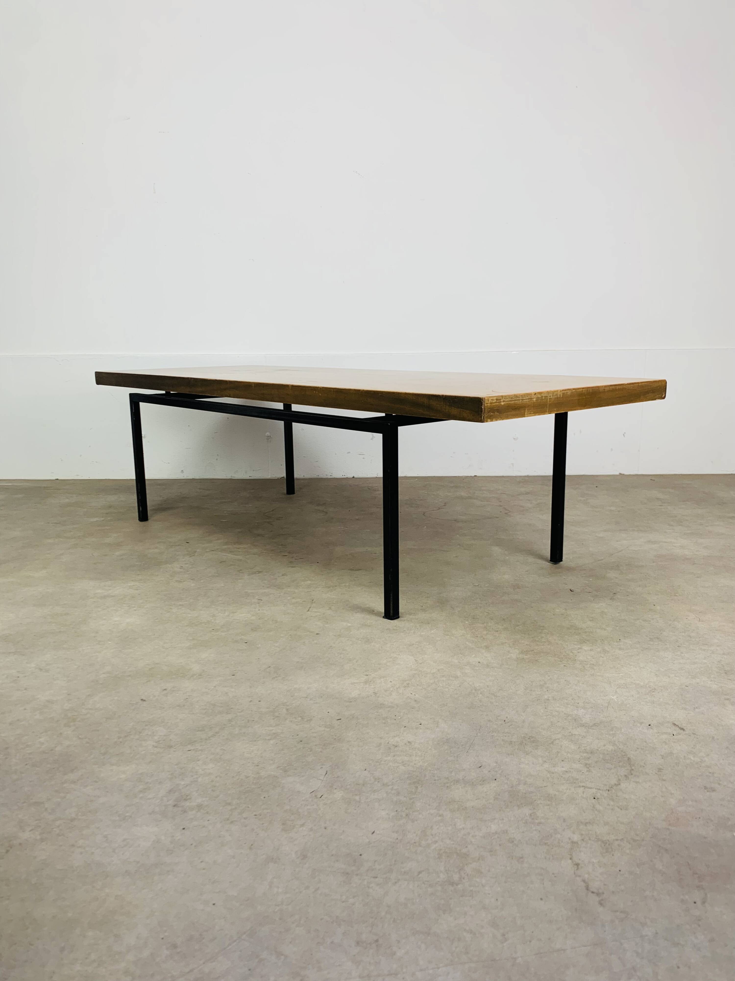 1950s modernist coffee table, wood and black metal.