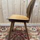 Suite de 4 chaises Baumann modèle œil en bois Design 1950s