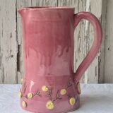 Glazed terracotta pitcher with mimosa decoration