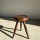 Brown solid wood stool seated circular dug