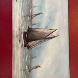 A pair of old paintings on wood.