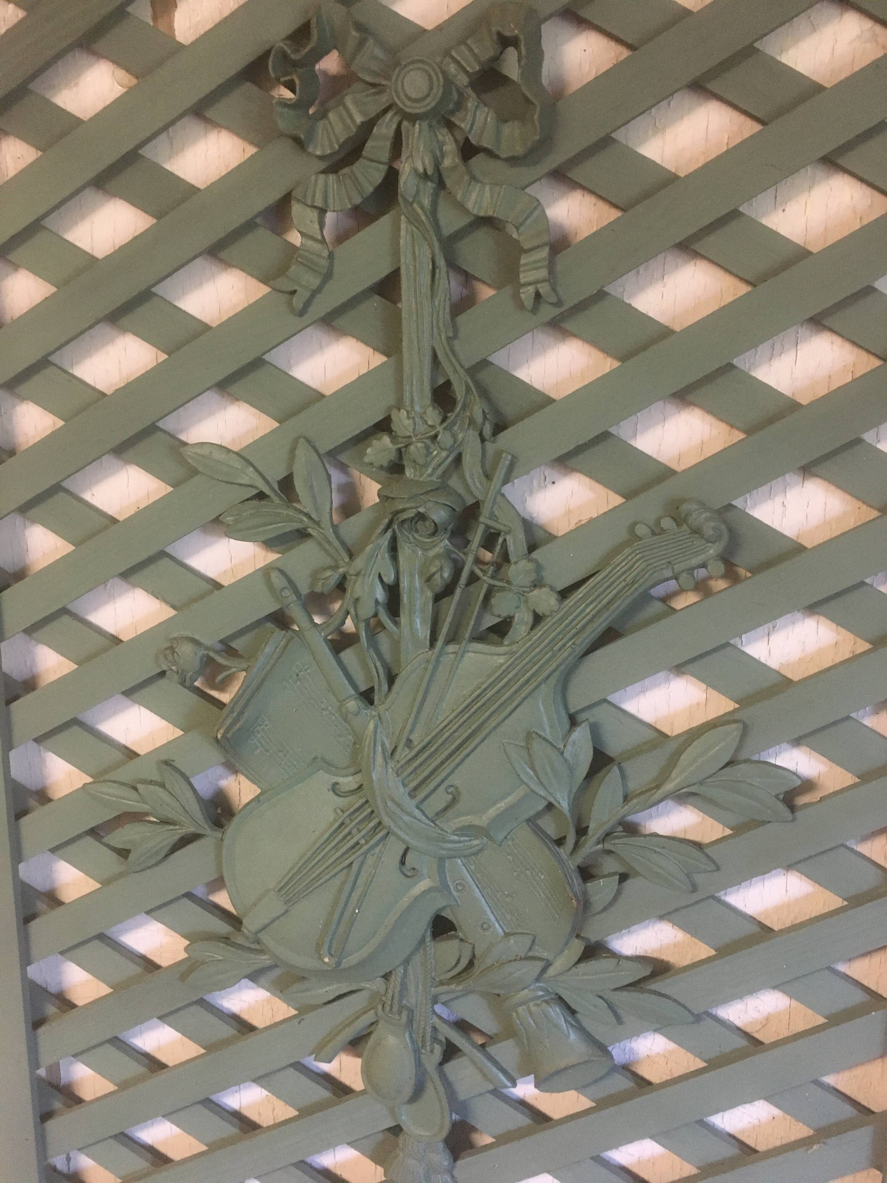 Wall panel, violin (resin) on wooden trellis