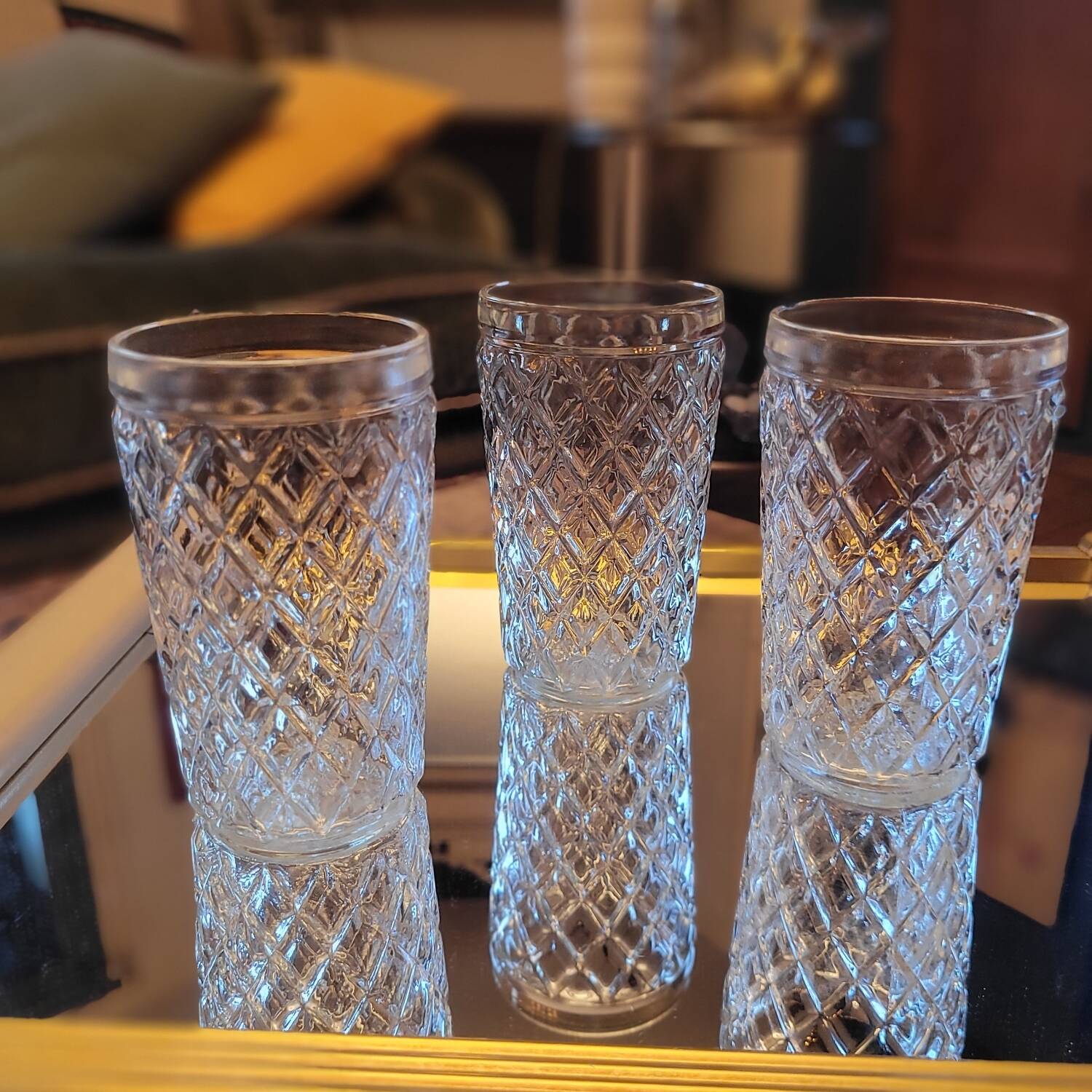 Set of three long drink glasses in pressed glass with a diamond pattern, 1960.