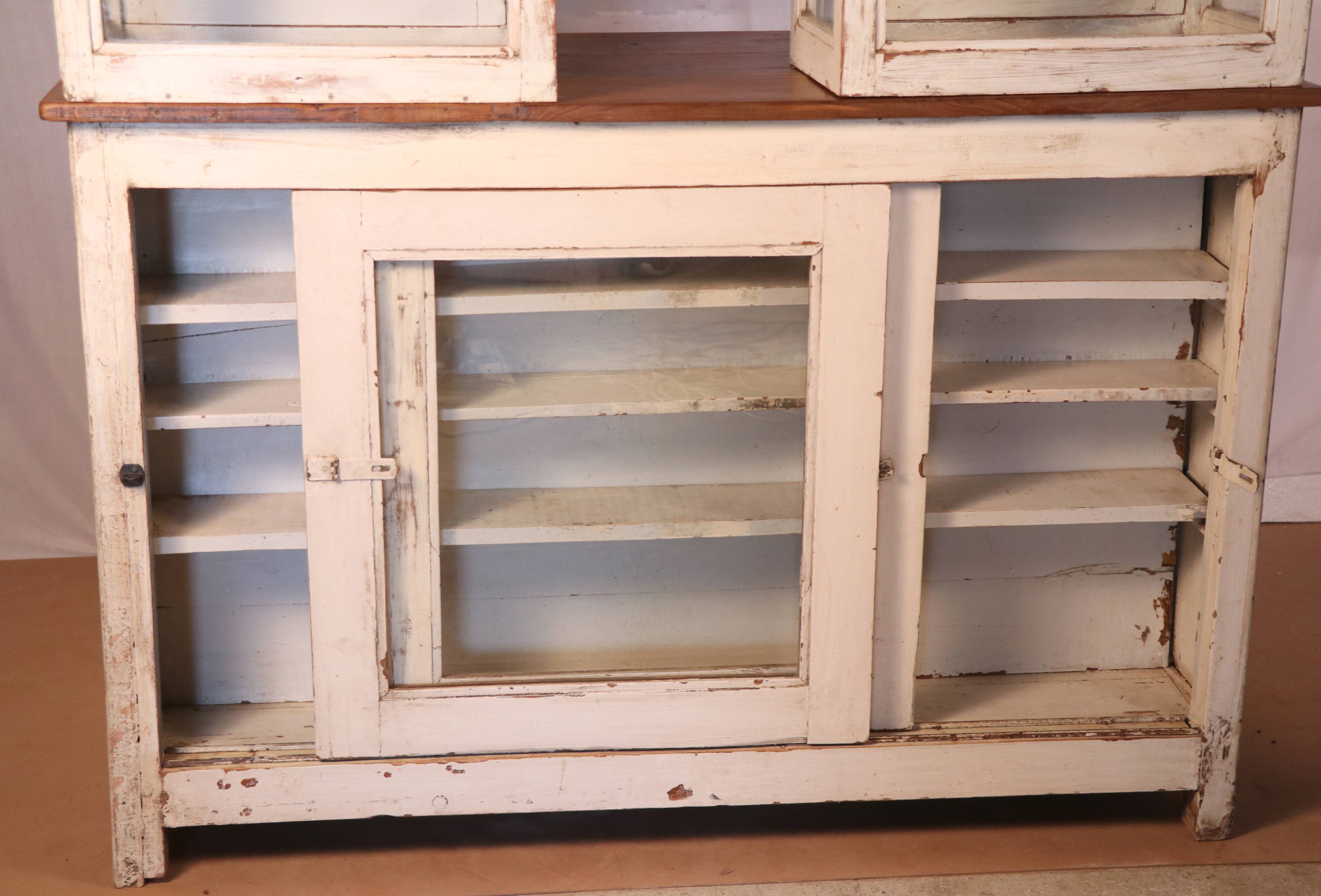 Merchant counter in Burmese teak with original white patina