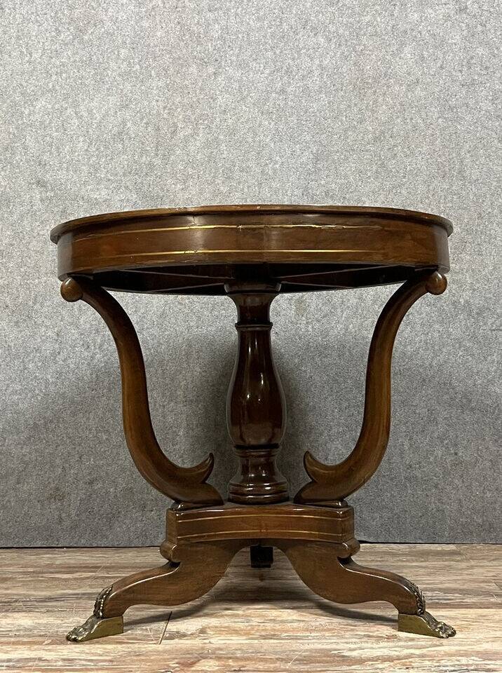 Lombard table from the Empire period in mahogany and brass trim circa 1820