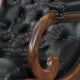 Fauteuil chesterfield en cuir de vachette noir classique et confortable