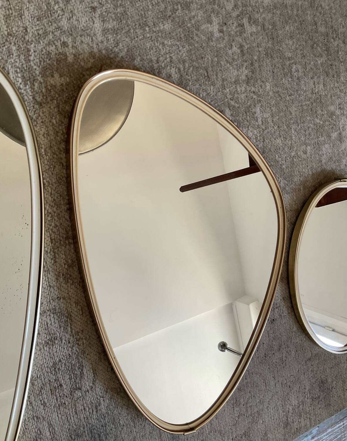 Trio of asymmetrical free-form mirrors from the 60s and 70s