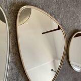 Trio of asymmetrical free-form mirrors from the 60s and 70s