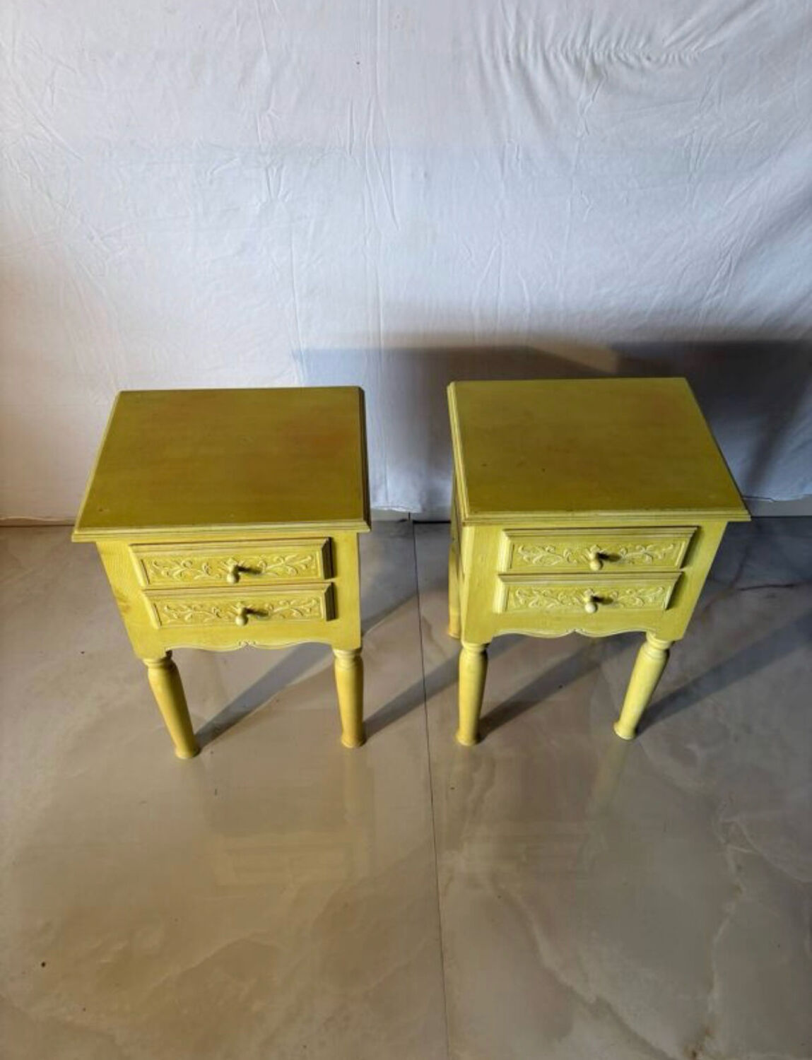 Pair of vintage carved wooden bedside tables.