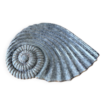 Shell-shaped ceramic catchall.