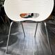 4 Tom Vac chairs designed by Ron Arad with a white round table of 110cm.