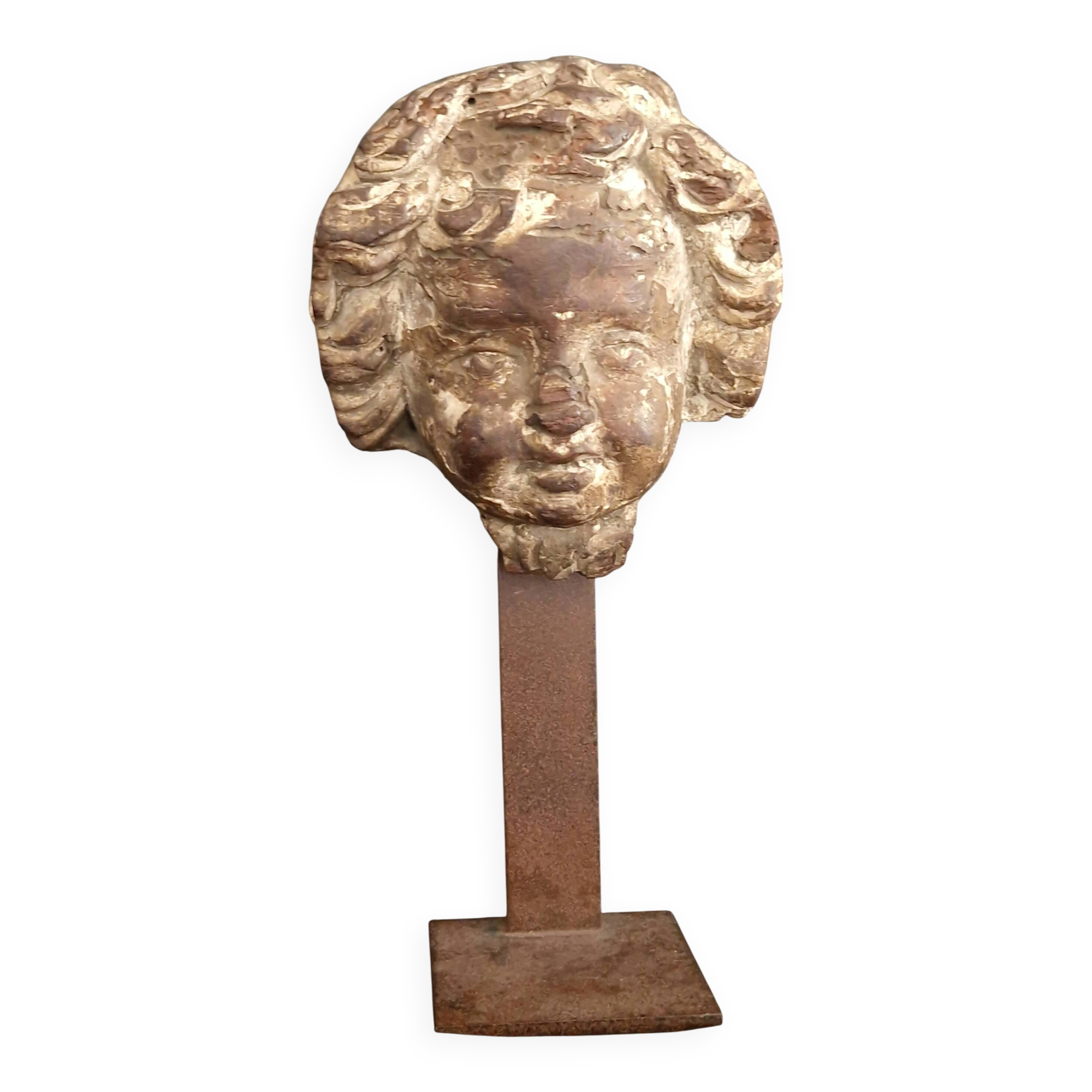 Sculpture. Ancient wooden angel head.
