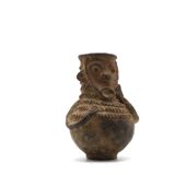 Mangbetu pottery container with hermaphrodite ancestor