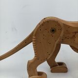 Articulated wooden lion