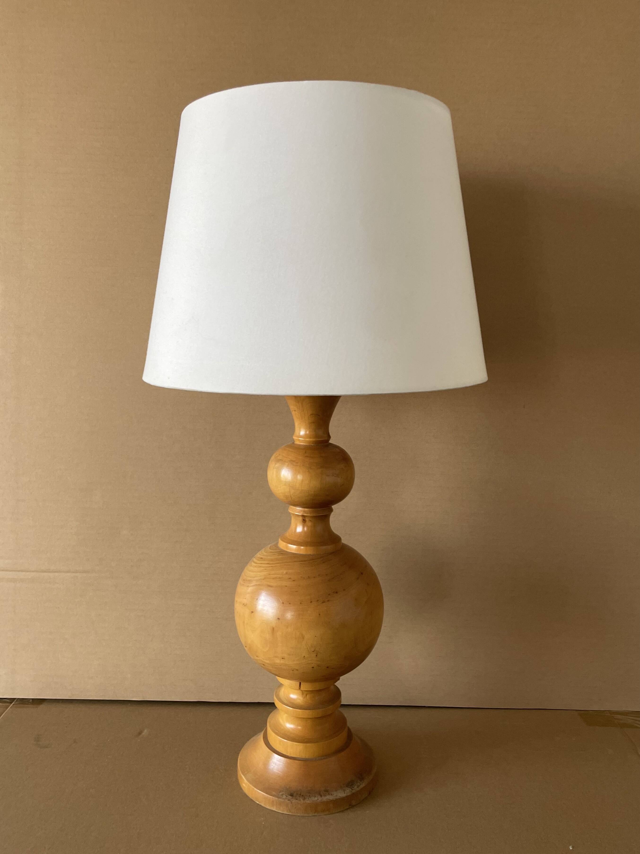 Large old turned wood lamp