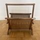 Brown rattan and cane magazine rack