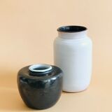 Duo of small black and white ceramic vases