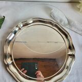 Round silver-plated serving dish with a glass base.