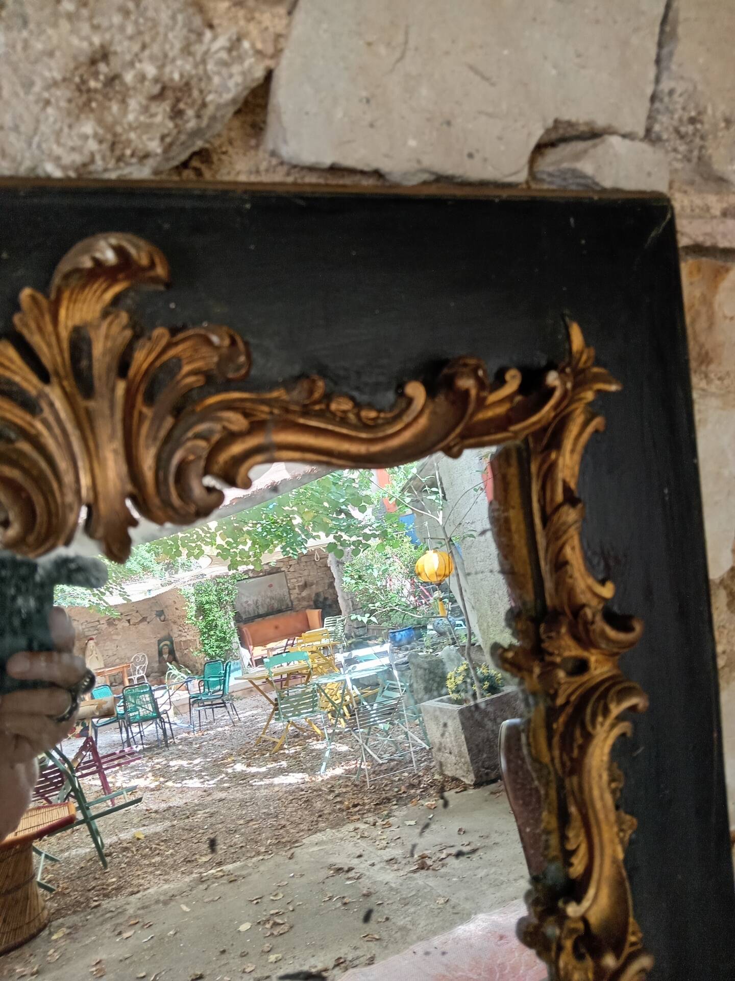 Antique mirror in stucco and wood