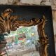 Antique mirror in stucco and wood