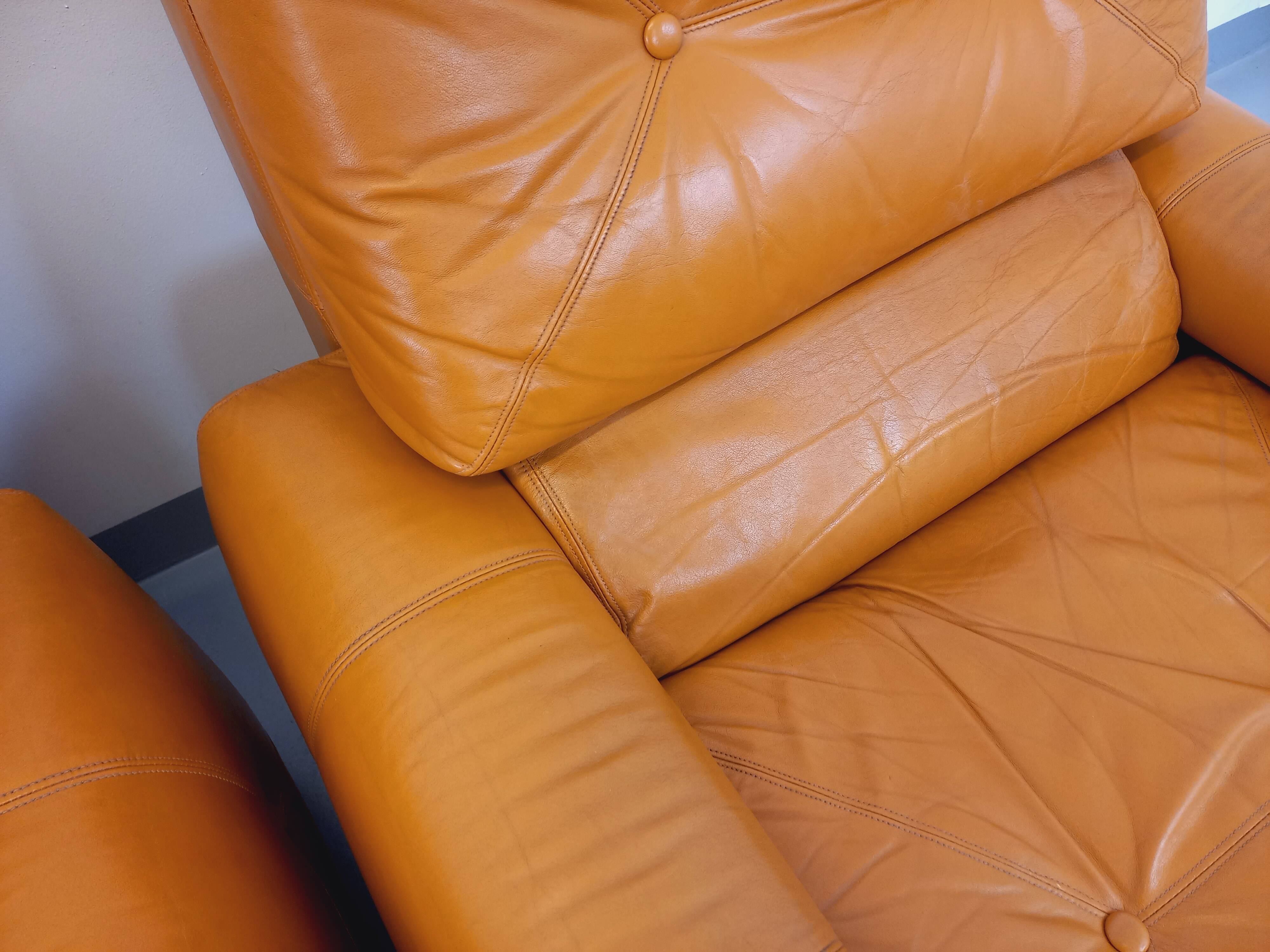 Pair of vintage leather lounge chairs from the 60s and 70s