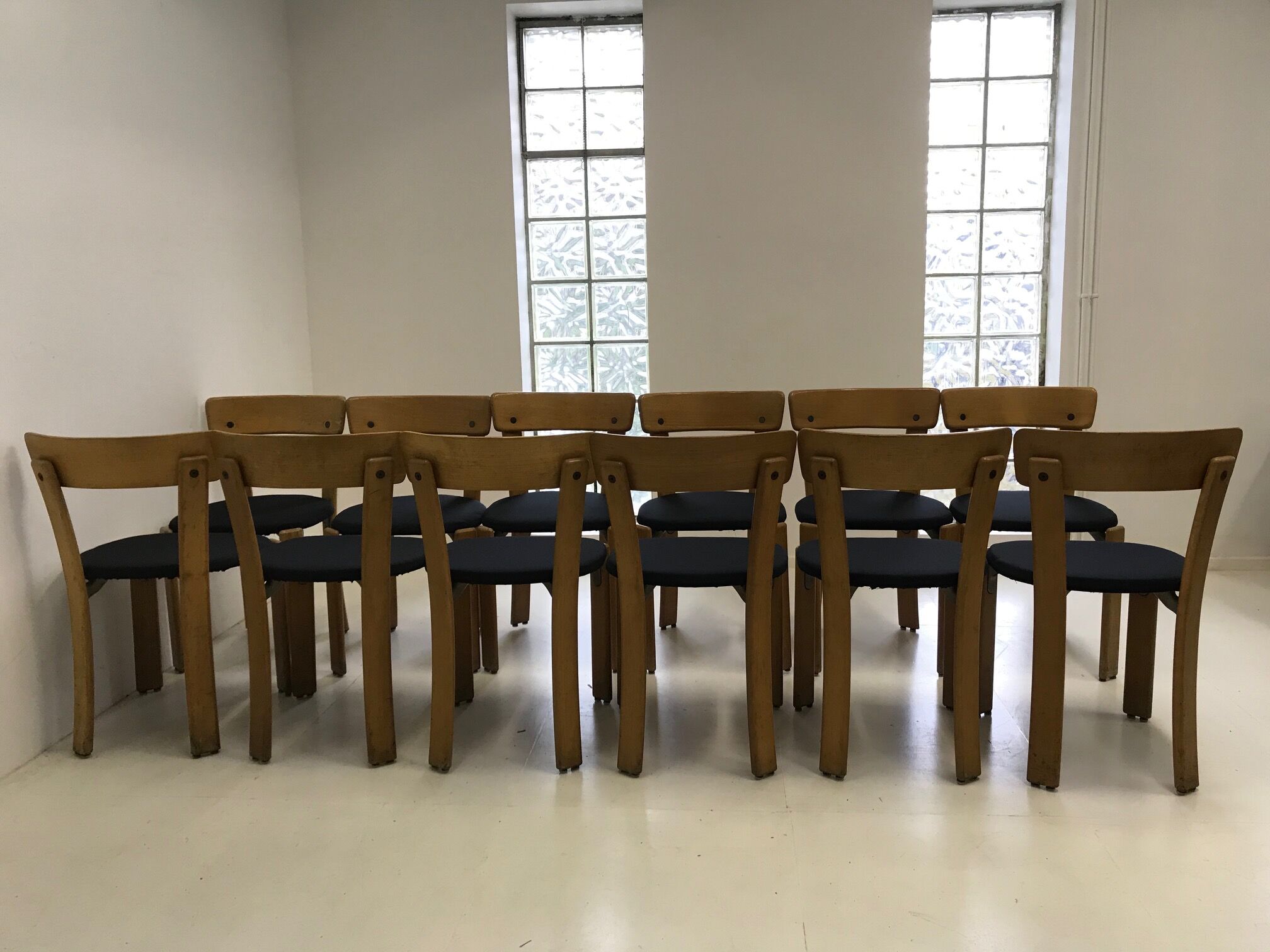 Designer Bruno Rey's suite of 12 chairs