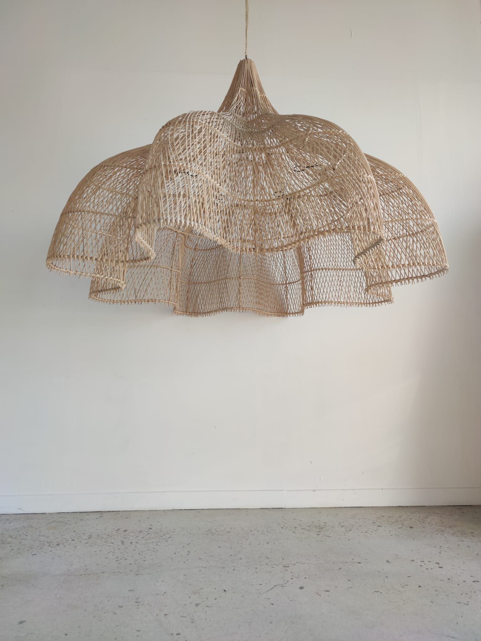Huge rattan suspension in the shape of a corolla H:1m; D: 1m50