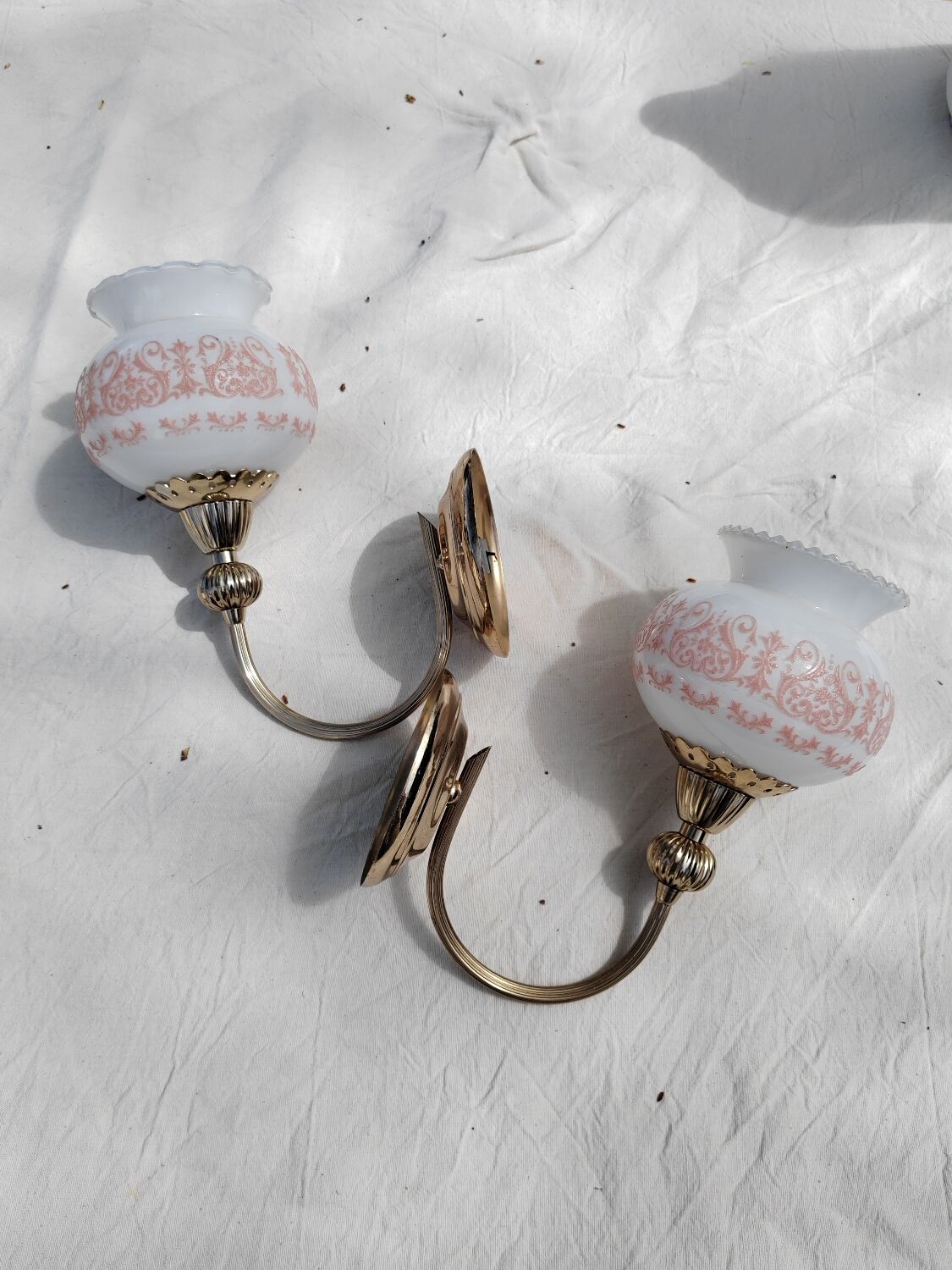 Pair of wall sconces with floral lampshades