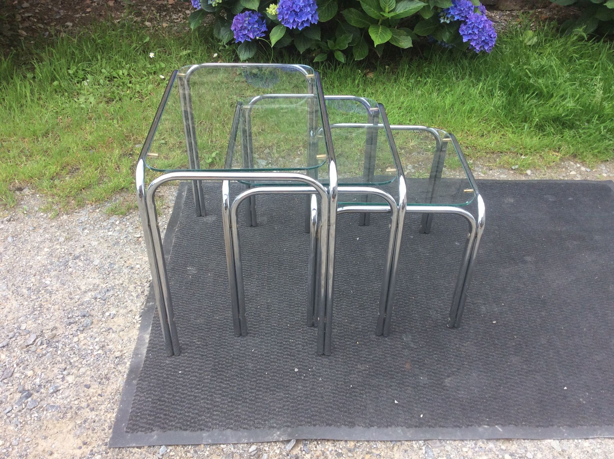 Vintage trundle tables in chrome tubular steel and glass