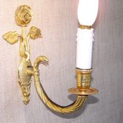 Simple wall sconce in classic Empire style made of vintage French cast brass 4316.