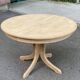 Renovated Scandinavian dining table in solid oak with a central leg from the 1970s.