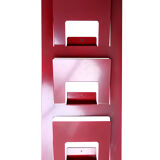 Vintage red metal wall magazine rack