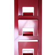 Vintage red metal wall magazine rack